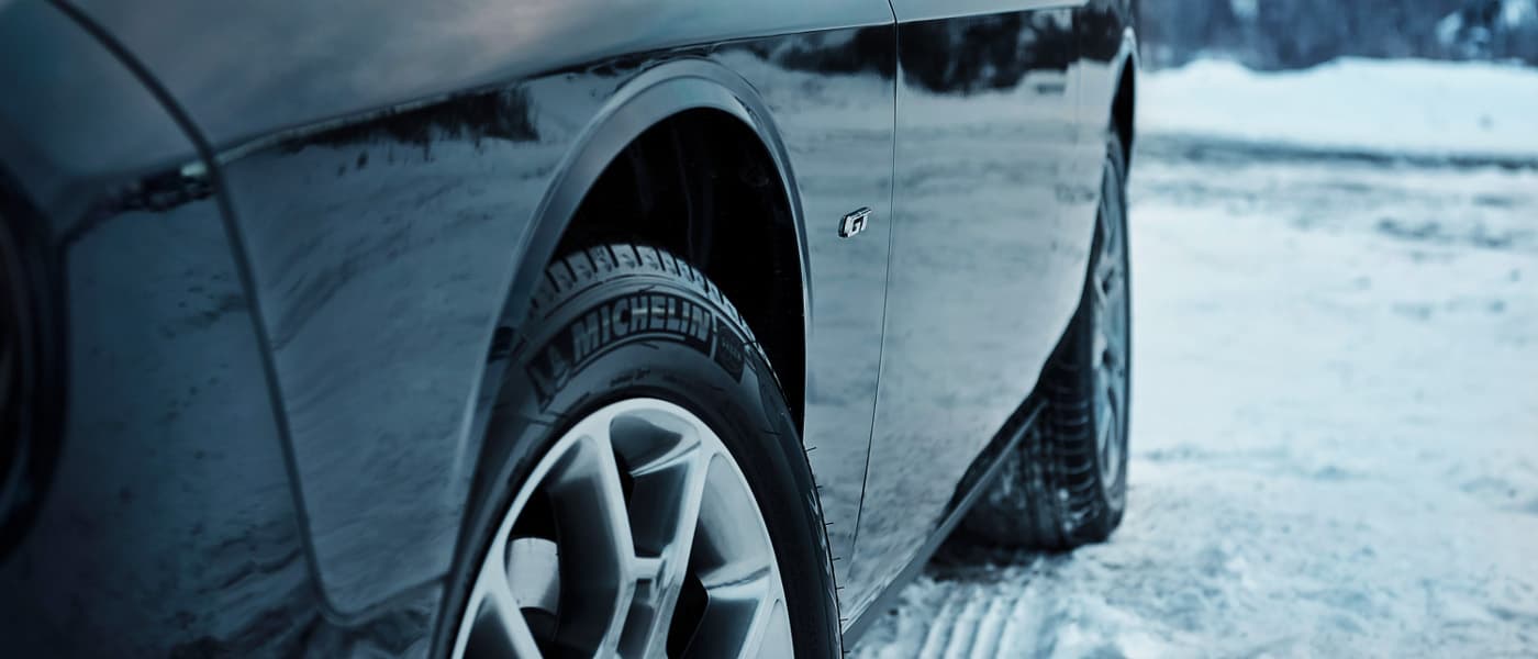 Dodge Challenger A black Dodge Challenger parked in the snow
