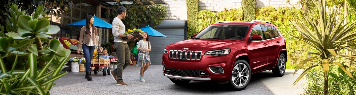 2019-Jeep-Cherokee-Overland-SUV-L01 (1).jpg New Jeep Cherokee outside a flower shop