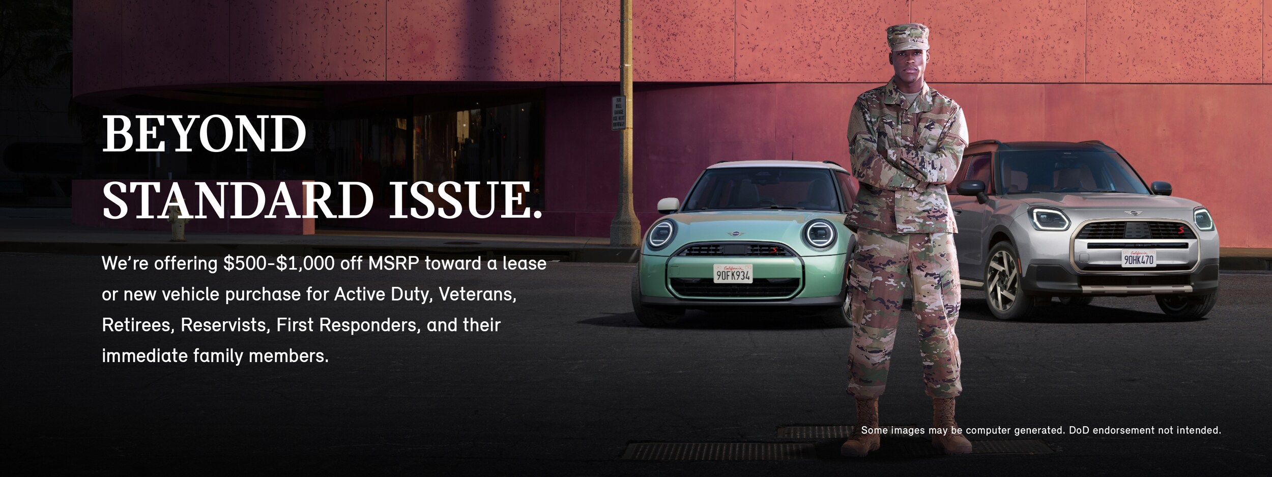 A man in a military uniform standing in front of a 2025 MINI Cooper S 2 Door and MINI Countryman S ALL4 with his arms crossed.