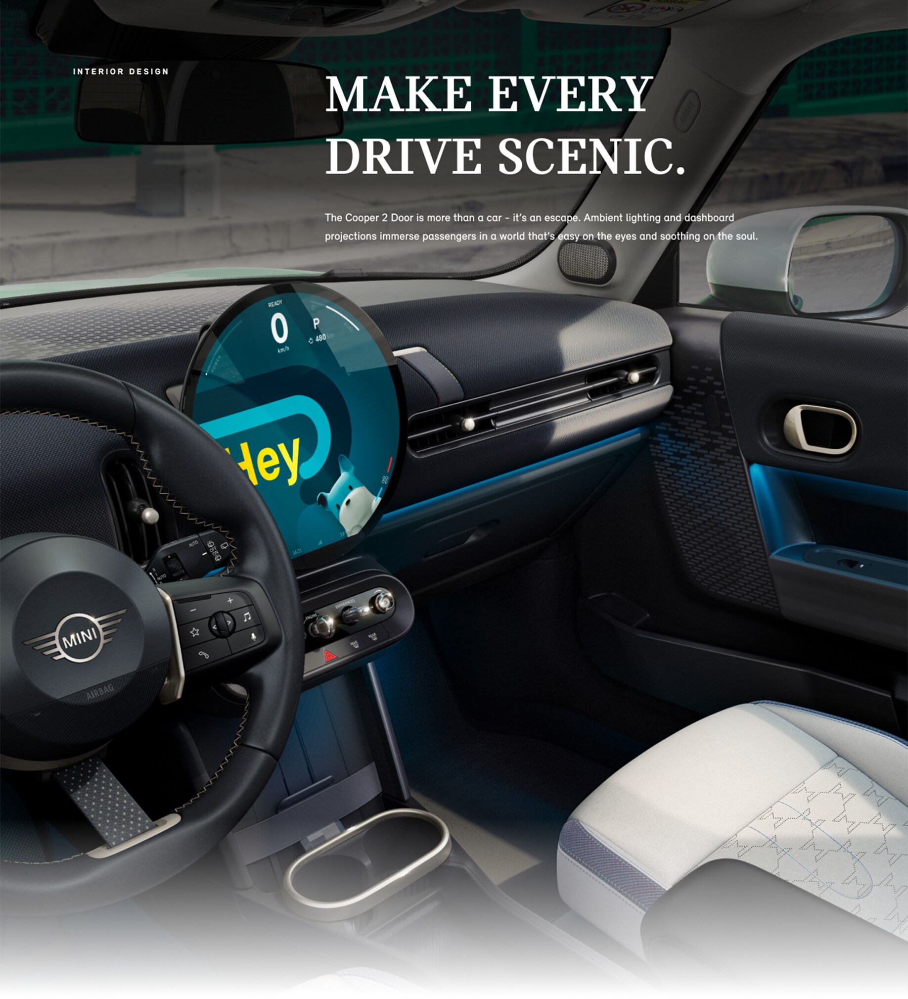 An angled-view of the inside of the Mini Cooper Hardtop 2 Door taken from the passenger's side showcasing the front
Sports Seats with blue skies and trees out the windows.