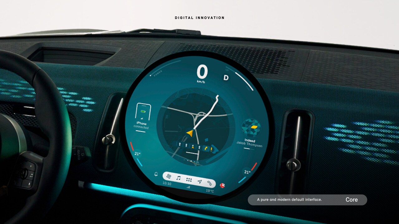 Closeup view of the MINI Countryman S ALL4 9.4-inch round center information OLED display interface.