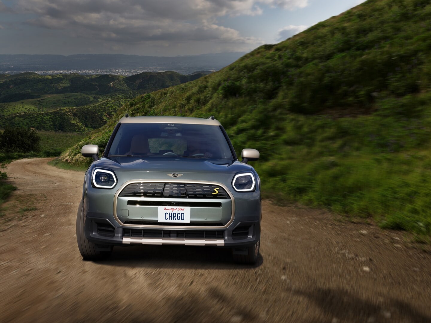The fully electric MINI Countryman SE ALL4, a subcompact SUV with 308 horsepower and all-wheel drive, capable of accelerating from 0 to 60 mph in 5.4 seconds.