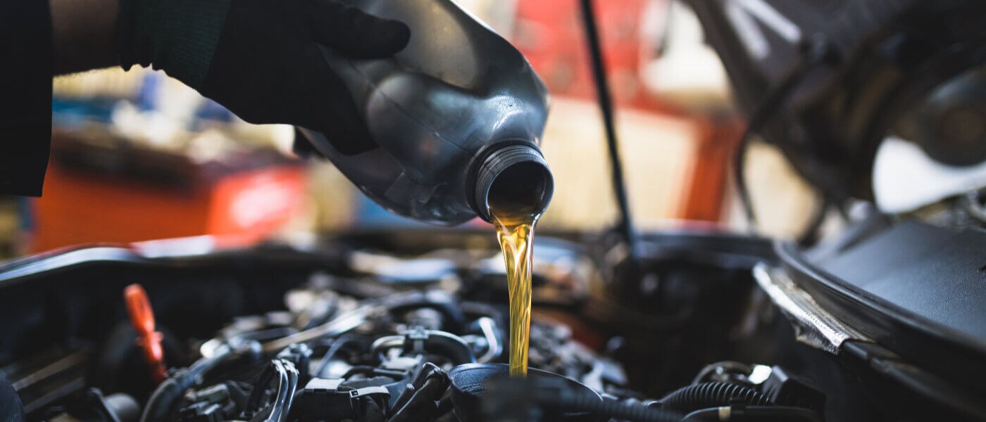 Service Oil Change Pouring Oil Wide