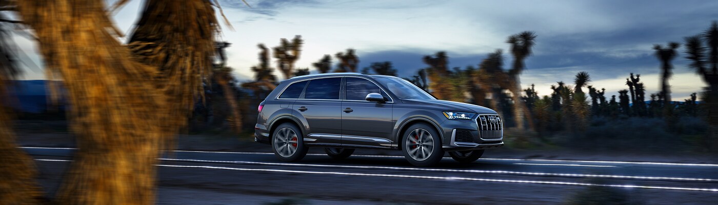 Audi SQ7 Audi SQ7 driving thru the desert at dusk