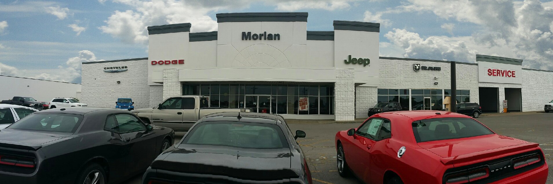 Front of Dealership edited sky - final picture.png