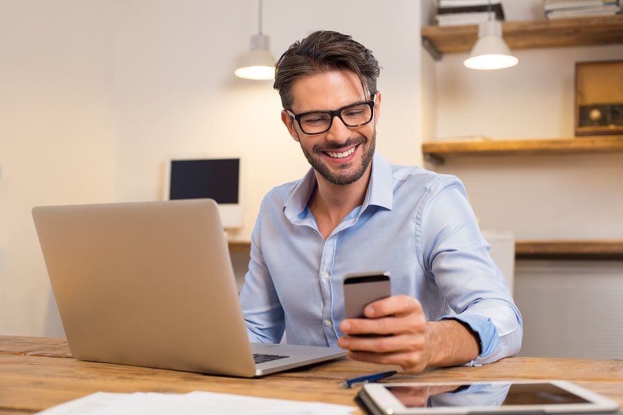Happy-man-using-smartphone.jpg