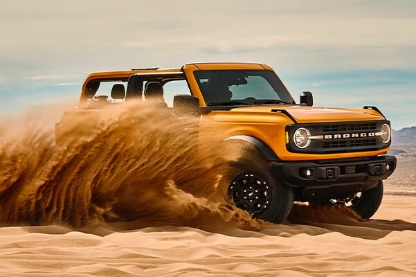 Interior of the 2021 Ford Bronco with mountain landscape through windows