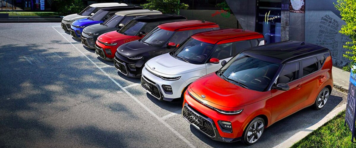 Colorful Kia Souls parked in a row