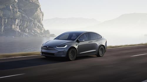 Tesla Model X All-Electric SUV Grey Tesla Model X driving on open road