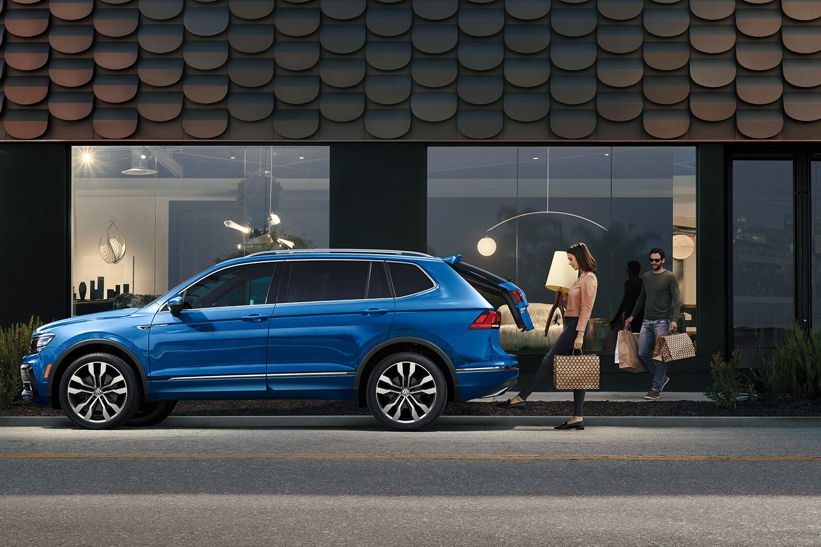 Volkswagen Tiguan in Front of a Cafe.jpg view volkswagen tiguan vs toyota rav4 engine vehicle comparison