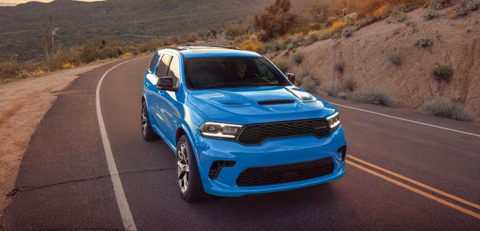 Dodge Durango Performance Specs blue dodge durango driving down road