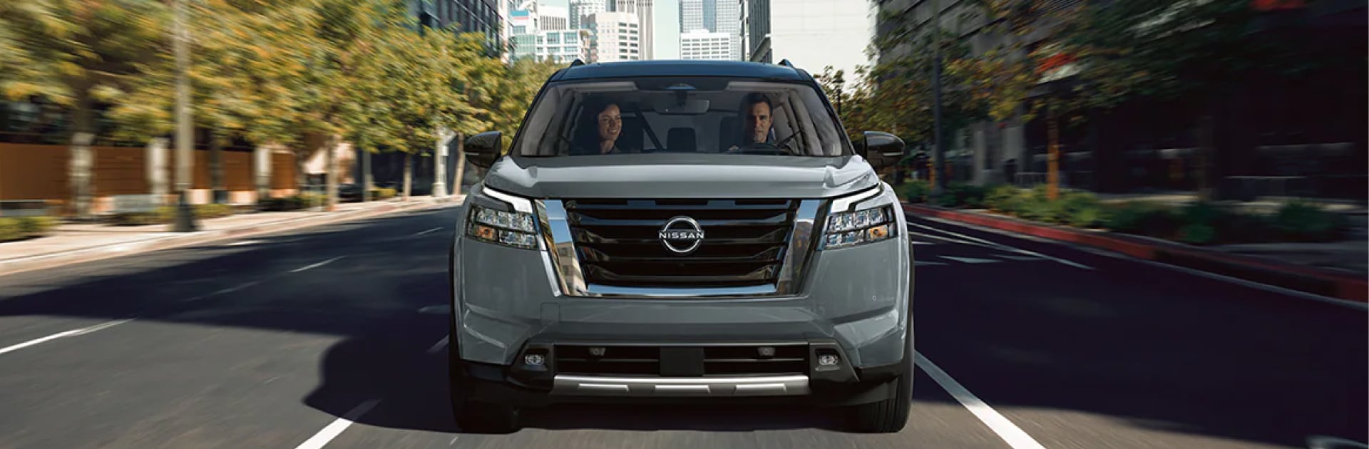 Nissan SUV driving on the street