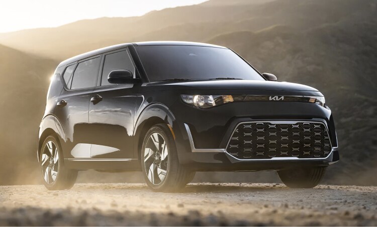 Parked black kia suv