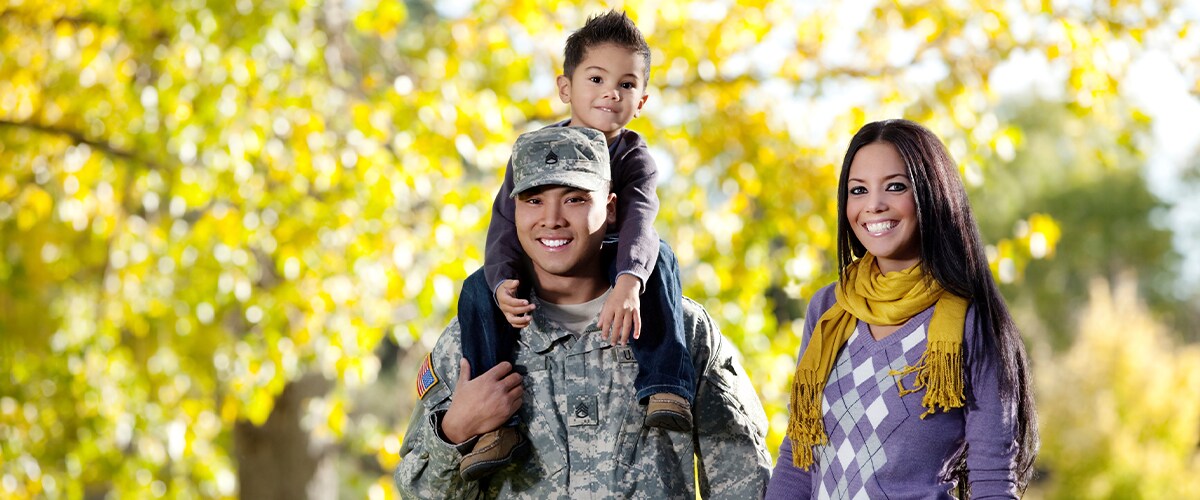 Military Family smiles at camera