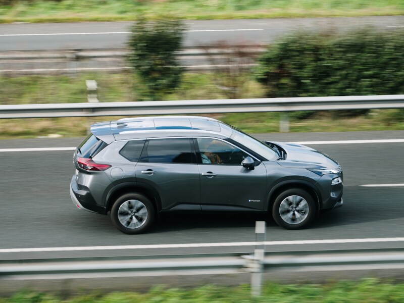 Gray Nissan SUV on the road