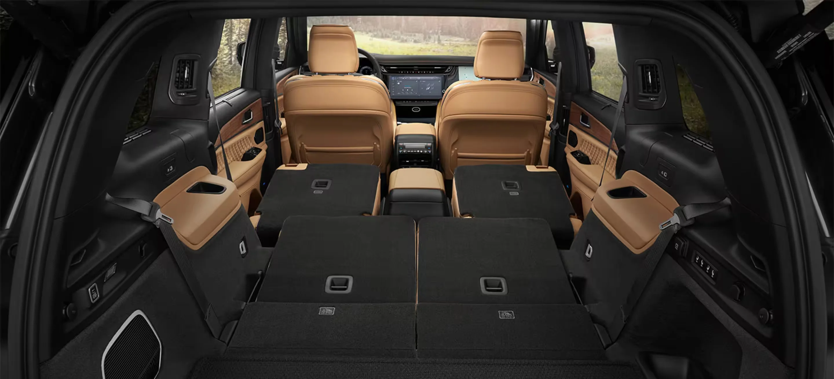 Cargo area of the 2026 Jeep Grand Cherokee with the second and third rows folded, showing the load space Jacksonville families use for youth sports gear