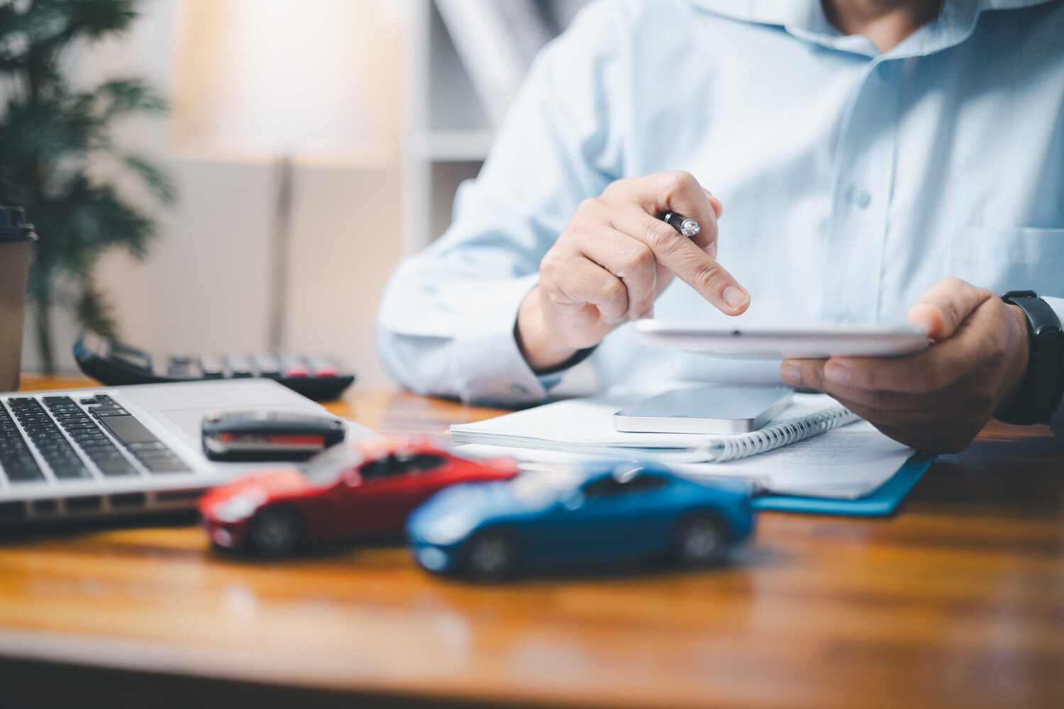 Finance Center team member reviewing finance options at New Brighton Ford