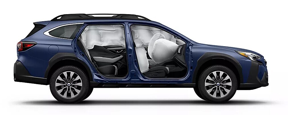 Blue Lincoln SUV driving on the highway