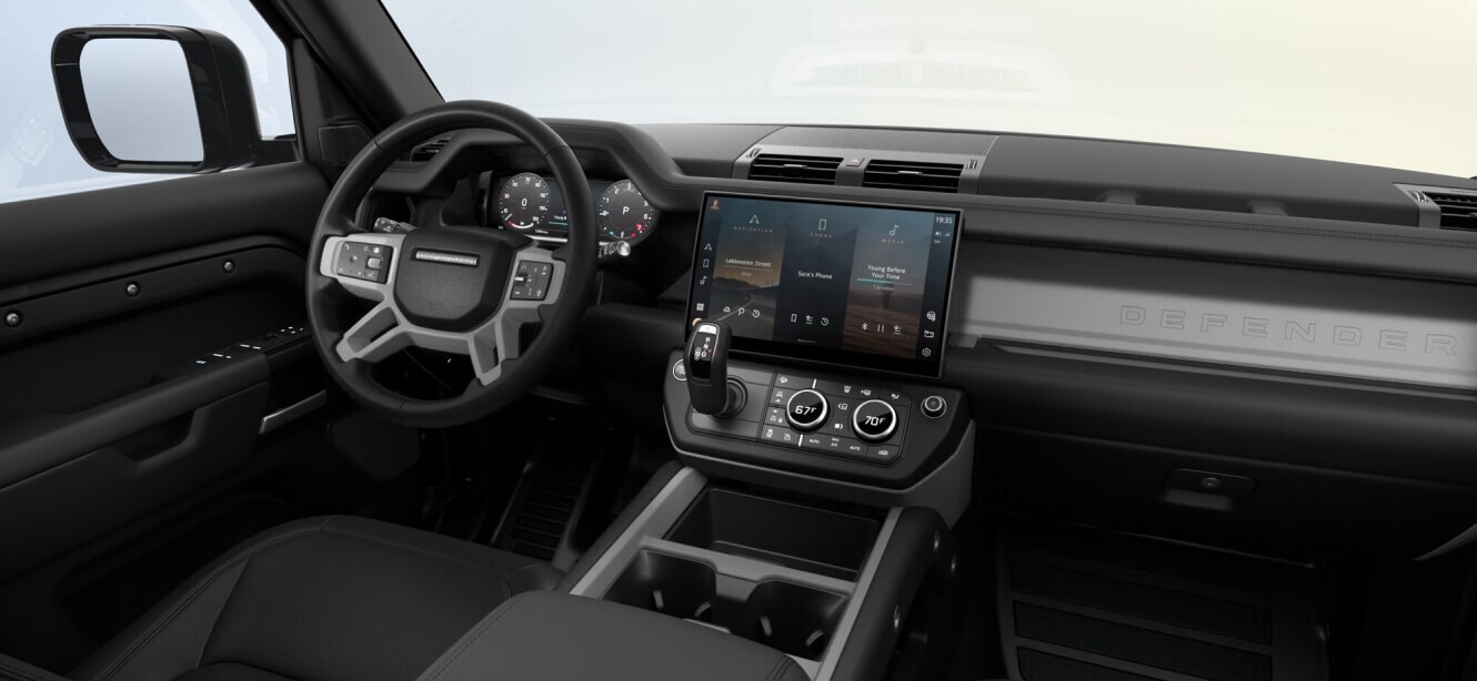 Interior dashboard view of a Land Rover Defender 130 X-Dynamic SE showing Ebony Resist interior.