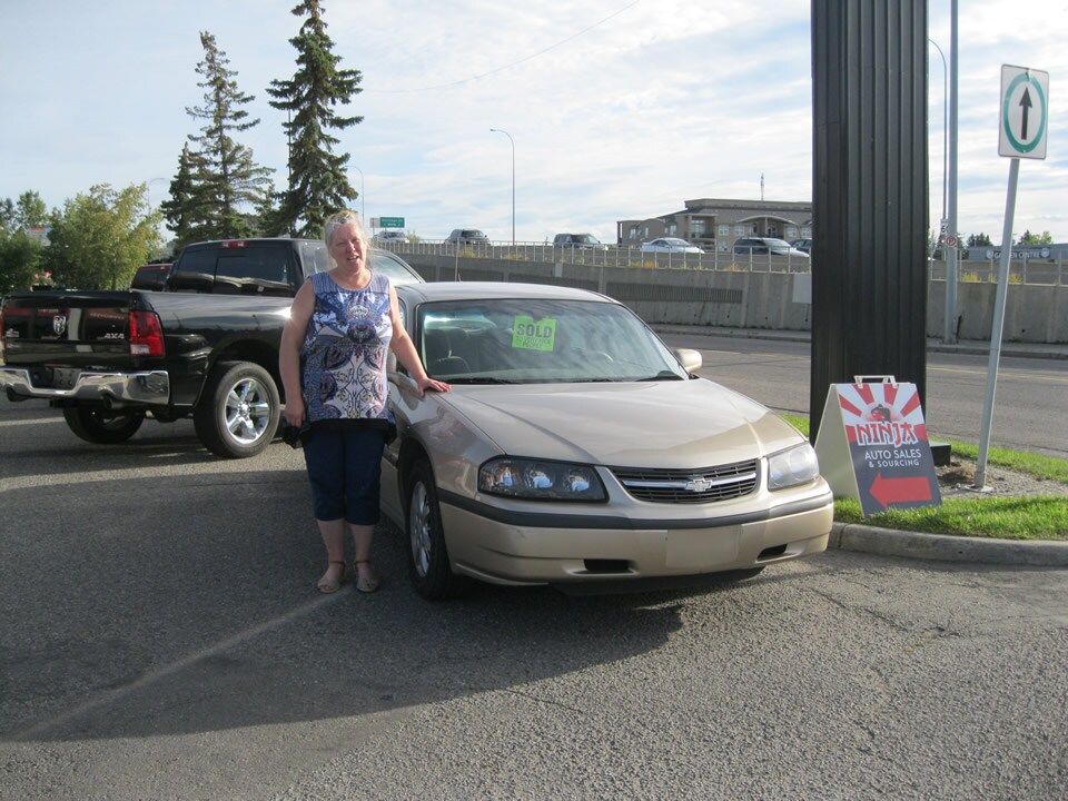 Terry with her new Chevrolet Impala