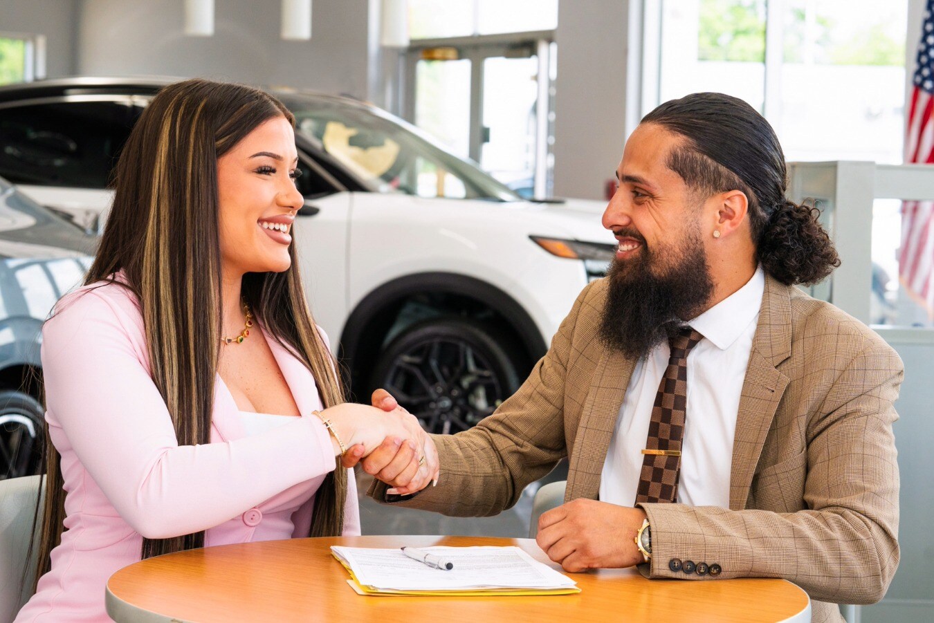 Employee and Customer Shaking Hands
