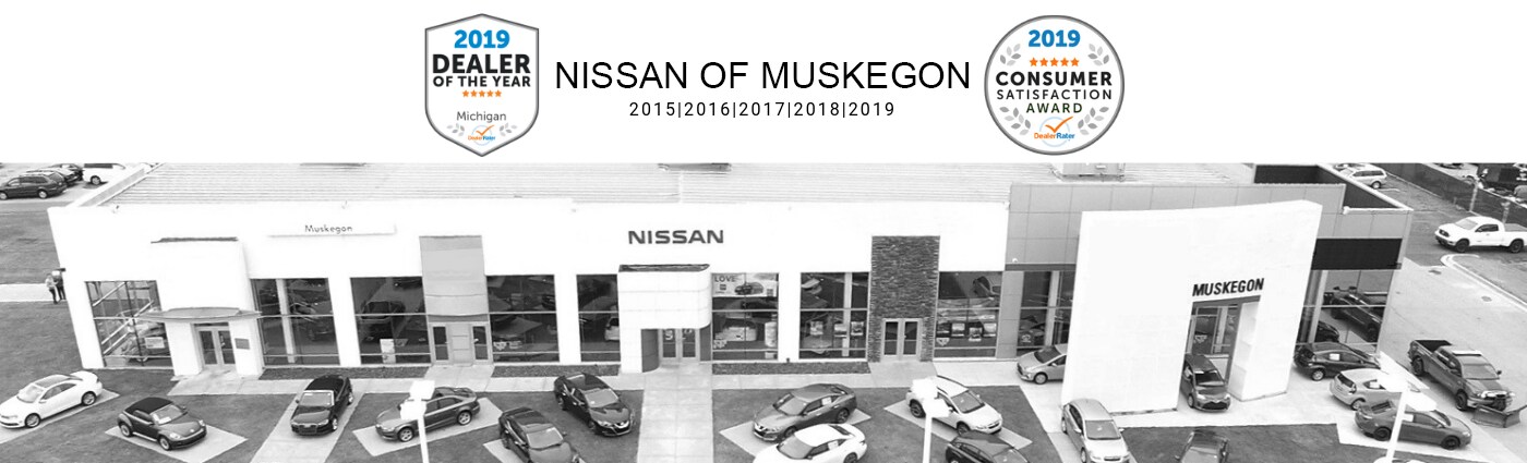 2019 nissan dealer of the year award with Image of Building.png