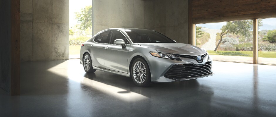 2018 Toyota Camry Wheel Options A silver 2018 Toyota Camry parked indoors