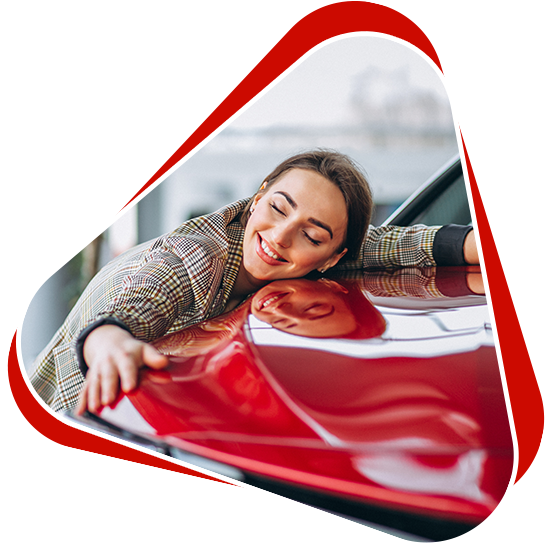smiling woman hugging vehicle