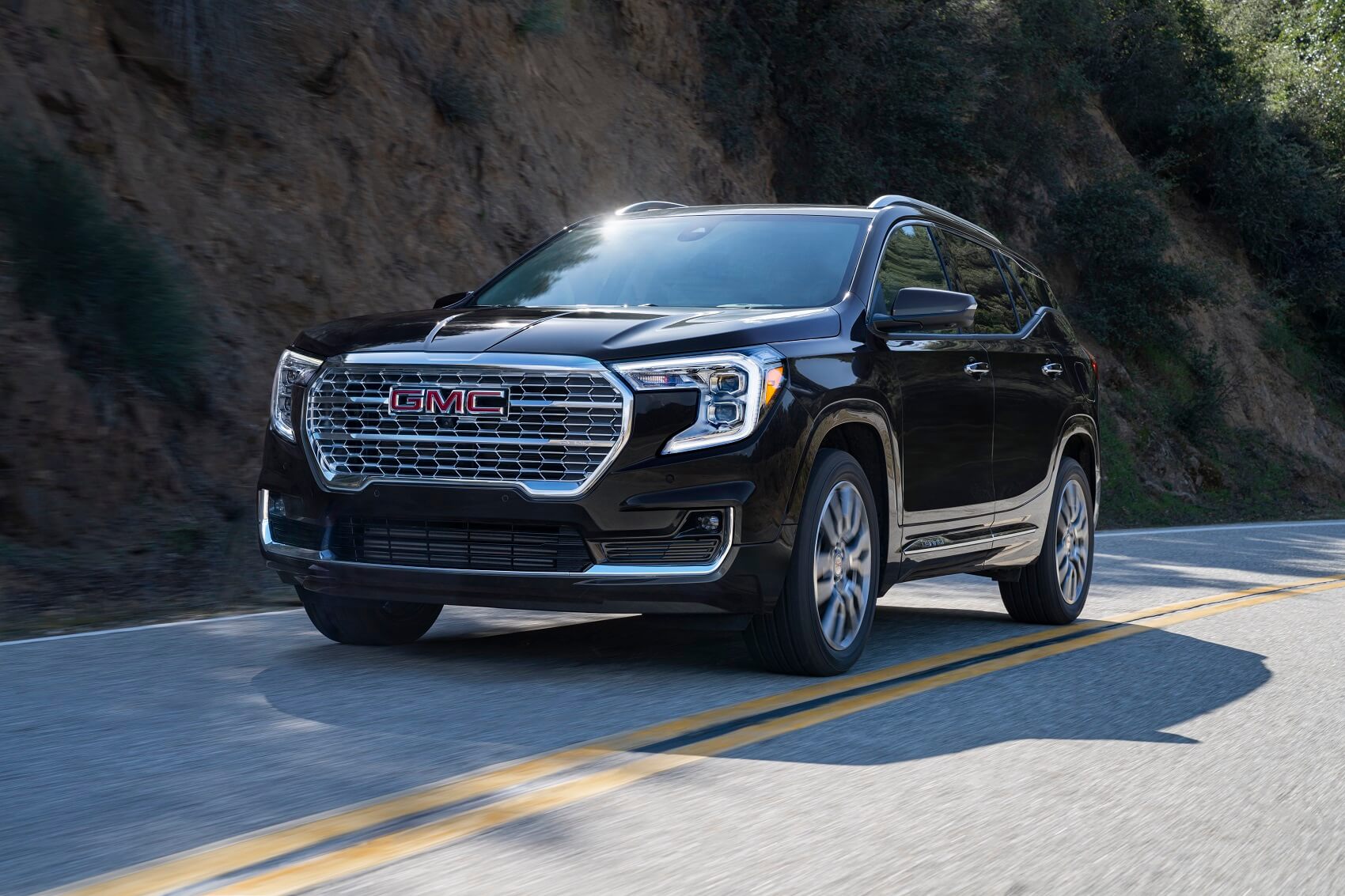 GMC Terrain driving along mountain road from Used Car Dealer Near La Mesa CA
