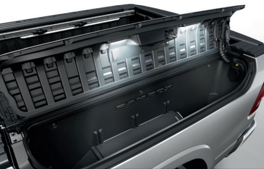 The 2 bed-side storage bins open with two lights on the bed of the All-New 2019 Ram 1500 available at Beaverton's Northwest Jeep Chrysler Dodge Ram