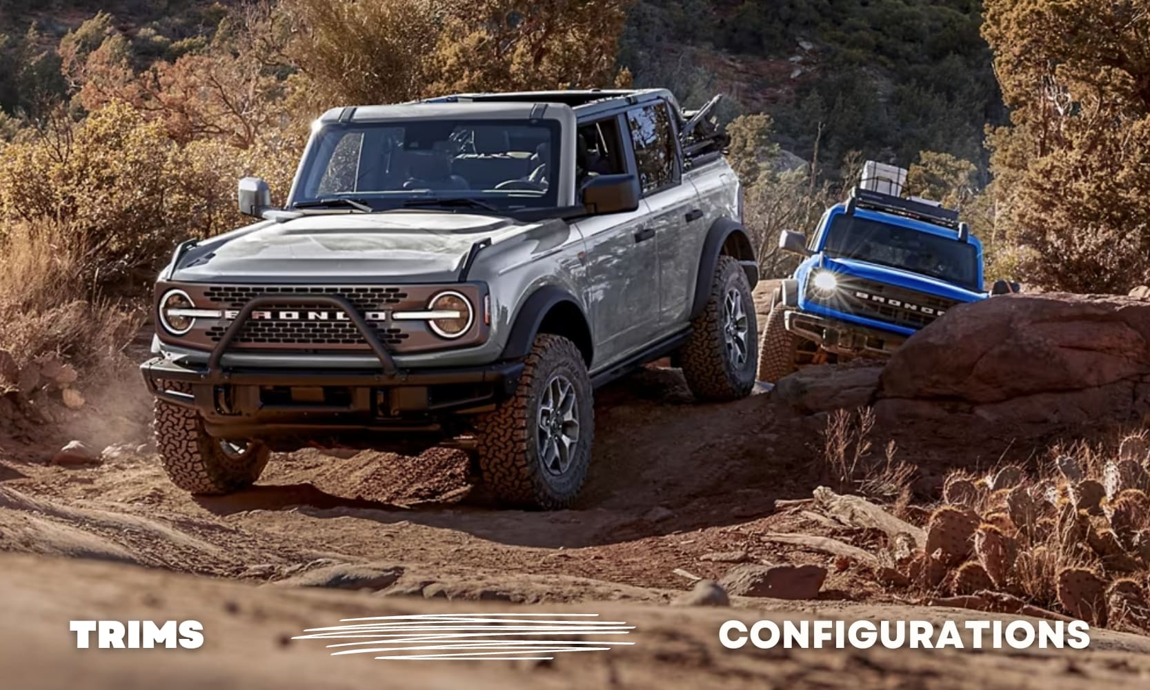 Two Ford Broncos following each other back to back as they ride over rocky off-road dirt paths