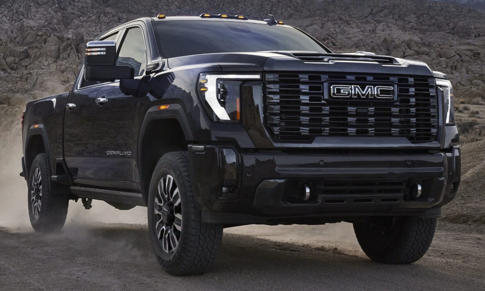 Comparison image of a 2024 GMC Sierra 2500 HD Denali Ultimate