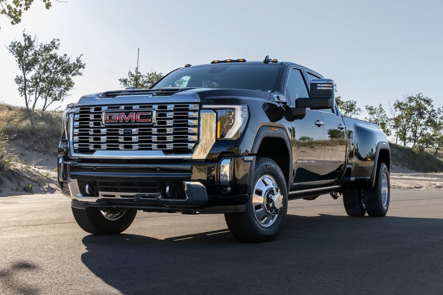 New 2024 GMC Sierra 2500 HD Denali Truck Comparison - Octane GMC of Santa Fe.jpg 2024 GMC Sierra 2500 HD Denali Truck in black exterior color