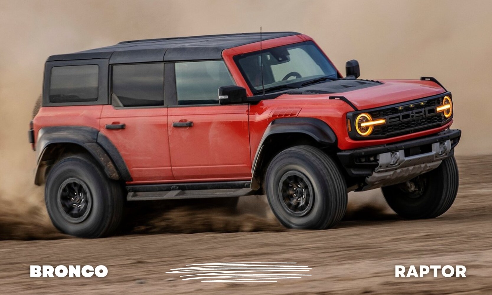 Passenger side angle of a red Ford Bronco Raptor tearing up a sandy off-road trail