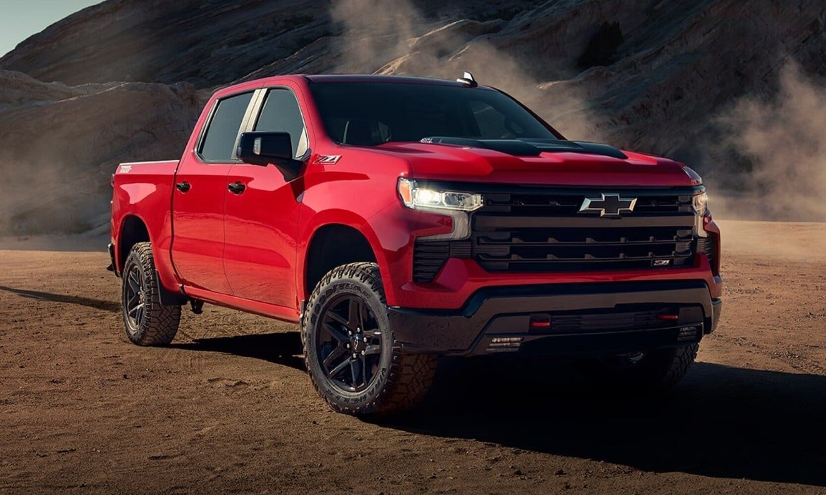Comparison image of the 2024 Chevy Silverado 1500 LT Trail Boss exterior