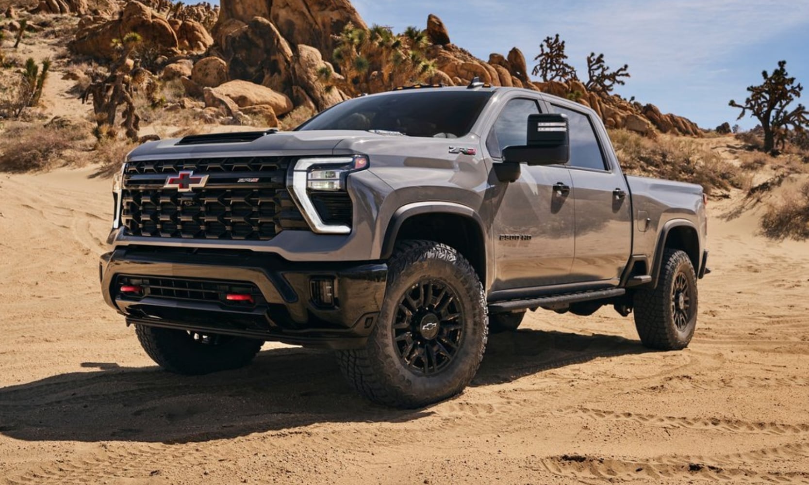 Comparison image of a 2024 Chevy Silverado 2500 HD ZR2