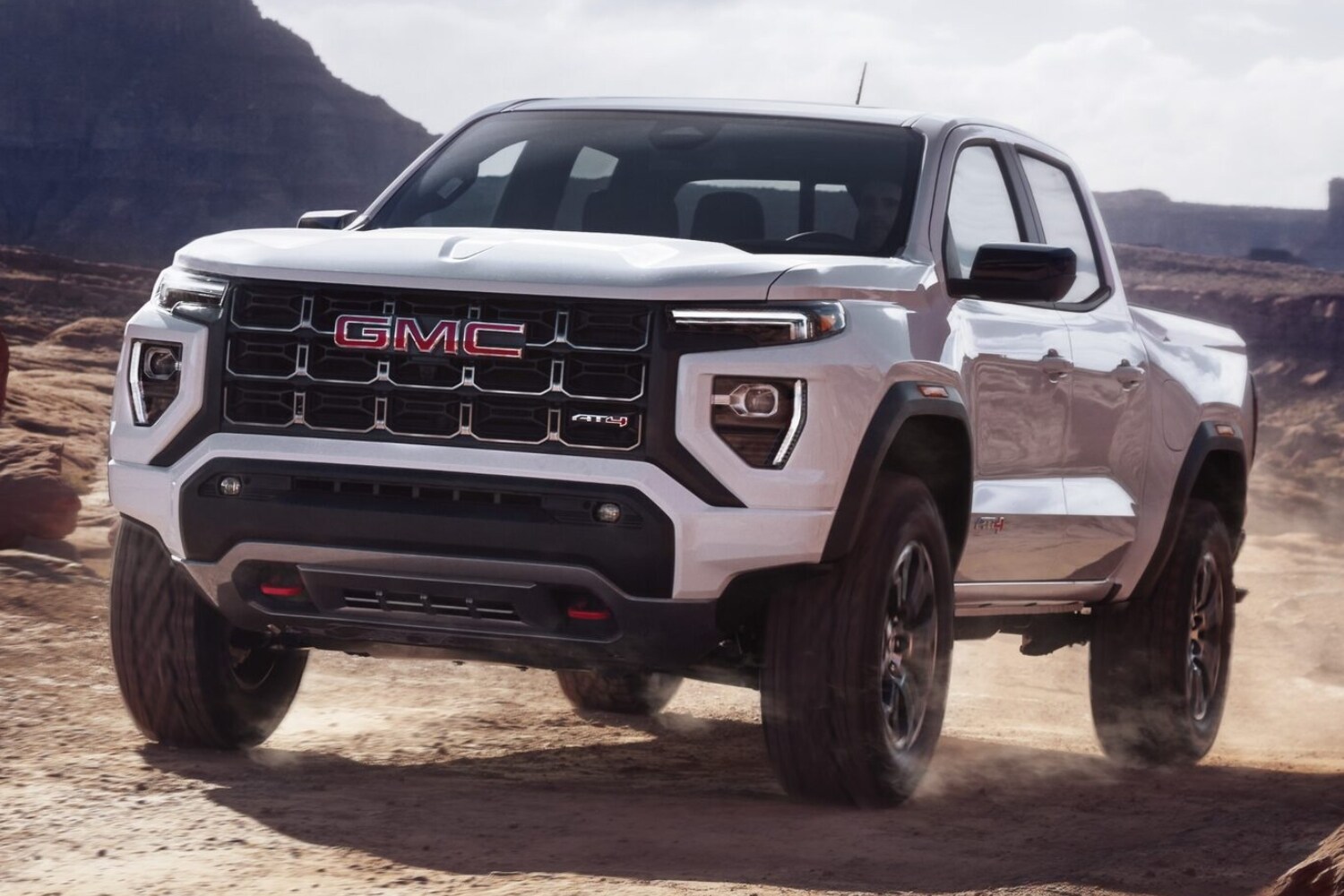 New 2023 GMC Canyon AT4 in summit white exterior color