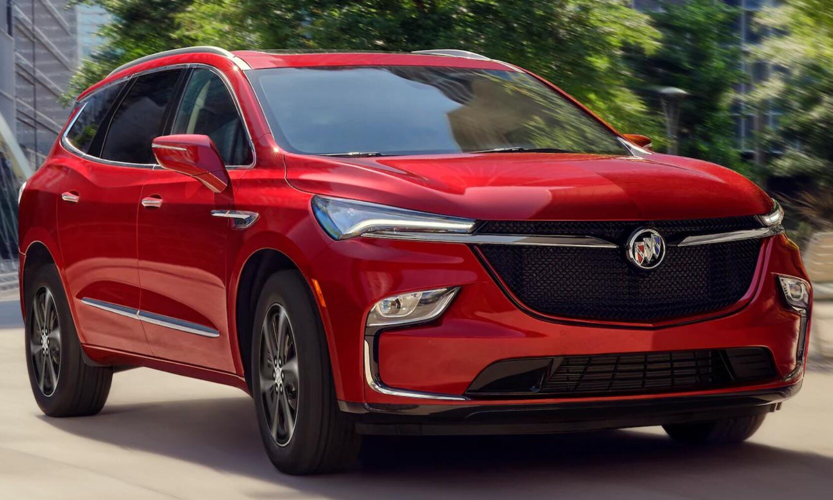 2022 Buick Enclave Exterior Comparison - Octane Buick GMC of Santa Fe.png Exterior view of a red 2022 Buick Enclave Sport Touring Package