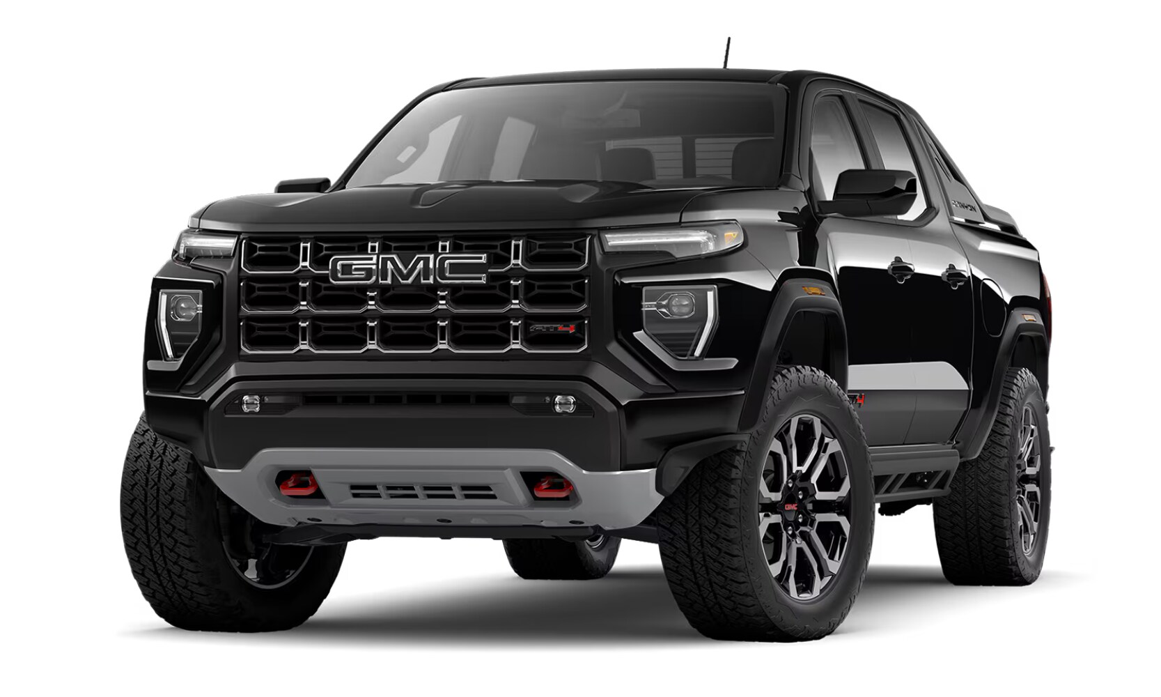 Exterior front angle image of a black 2026 GMC Canyon AT4 Nightfall Edition parked on a white background