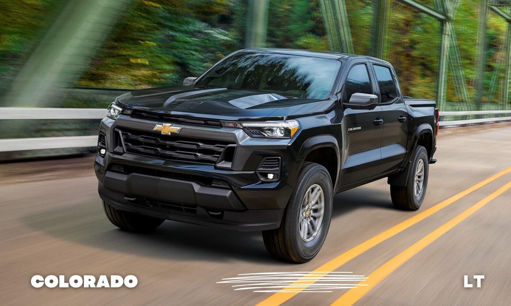 Best%20Used%20Chevy%20Colorado%20LT%20Trucks%20-%20Octane%20GMC%20of%20Santa%20Fe.jpg a black used Chevy Colorado LT truck driving over a green metal bridge