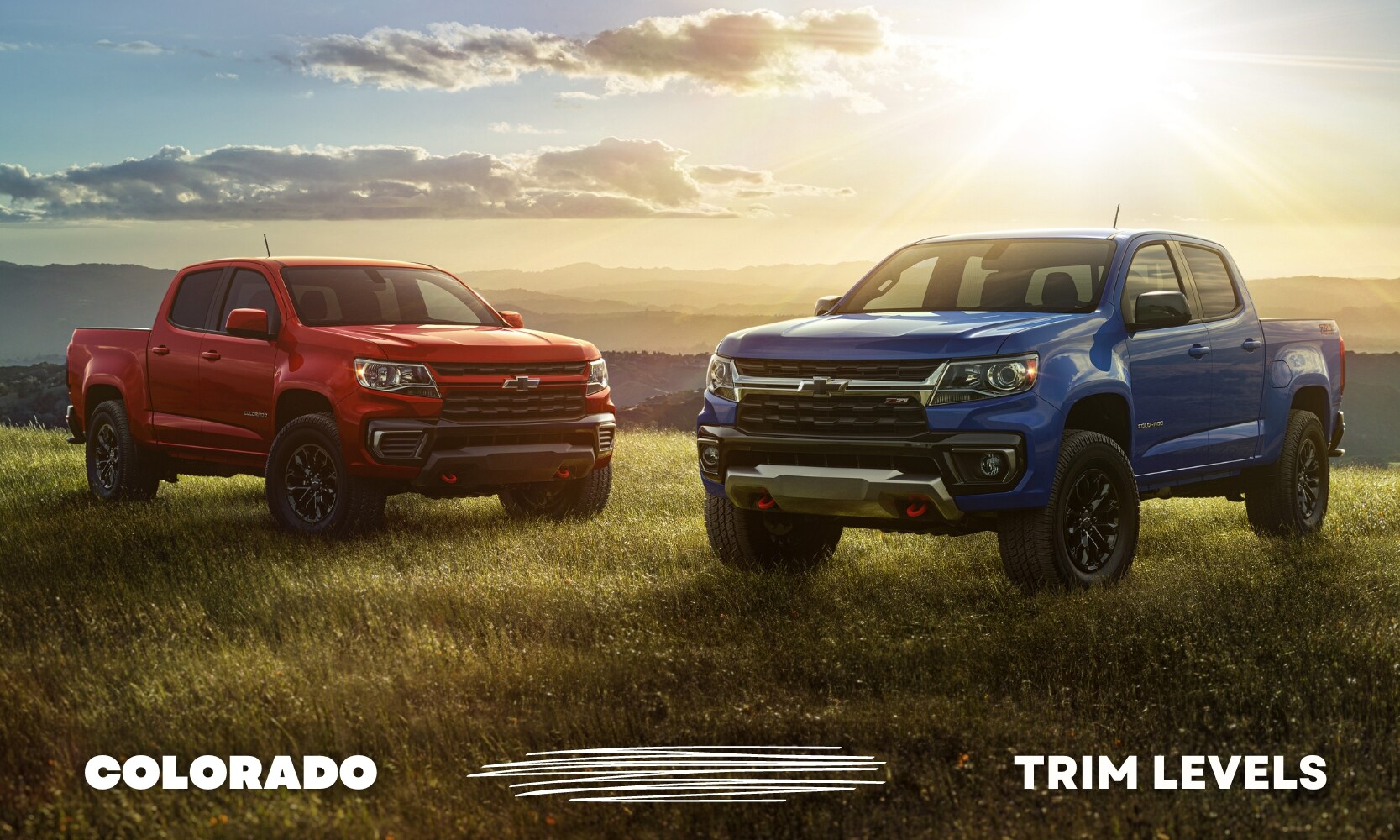 Best%20Used%20Chevy%20Colorado%20Trim%20Levels%20-%20Octane%20GMC%20of%20Santa%20Fe.jpg a blue used Chevy Colorado Z71 truck on the right next to a red used Chevy Colorado Trail Boss truck on the left