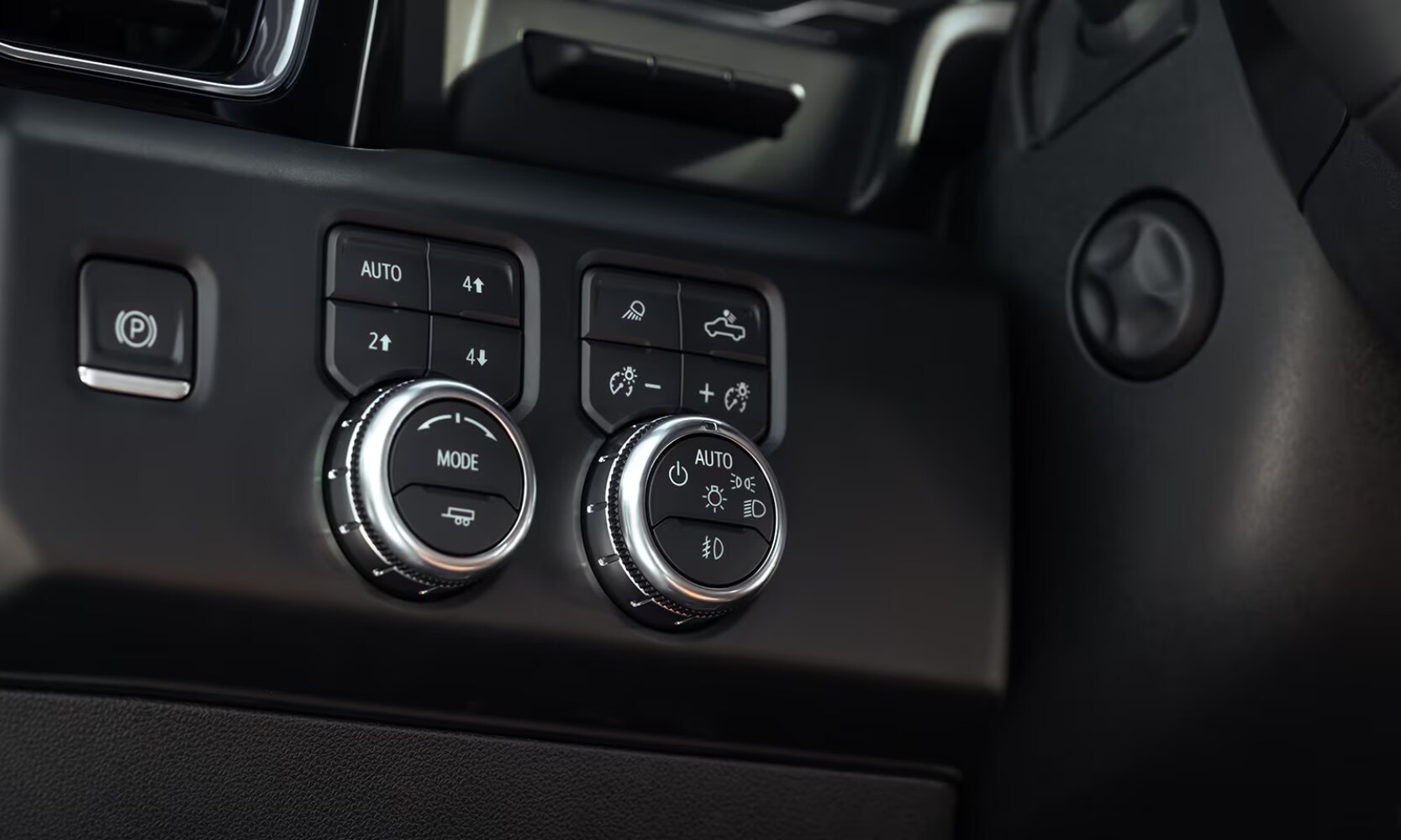 2026%20GMC%20Sierra%201500%20Drive%20Modes%20-%20Octane%20GMC%20of%20Santa%20Fe.png Closeup image of the 2026 GMC Sierra 1500 Denali's drive mode select system showing its button controls