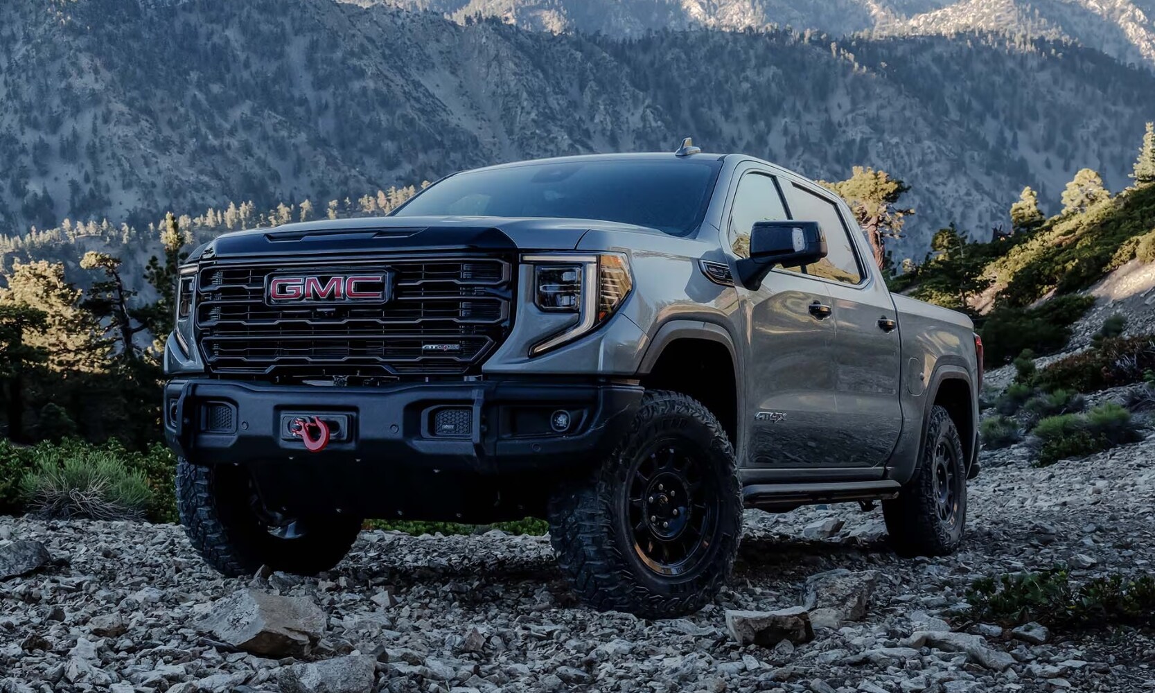 2025 GMC Sierra 1500 vs. 2025 RAM 1500 - 2025 GMC Sierra 1500 AT4X AEV - Octane GMC of Santa Fe.jpg