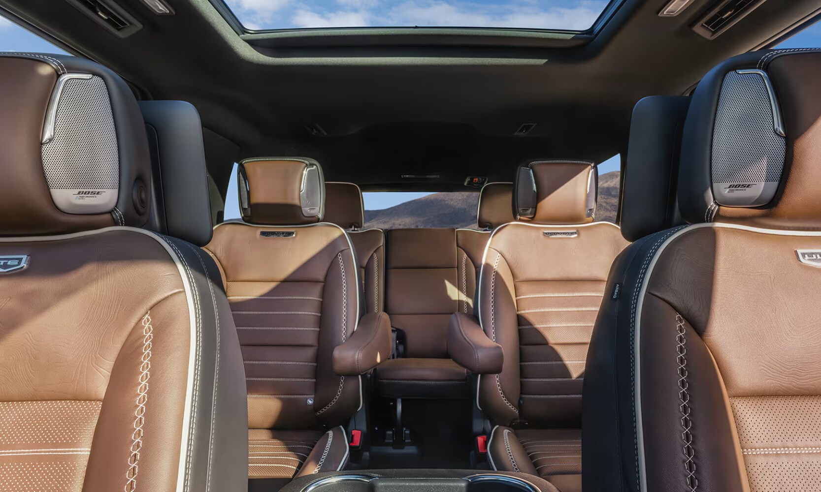 2026%20GMC%20Yukon%20Interior%20-%20Octane%20GMC%20of%20Santa%20Fe.png Interior image of the 2026 GMC Yukon Denali's three-row tan leather seats and a sunroof