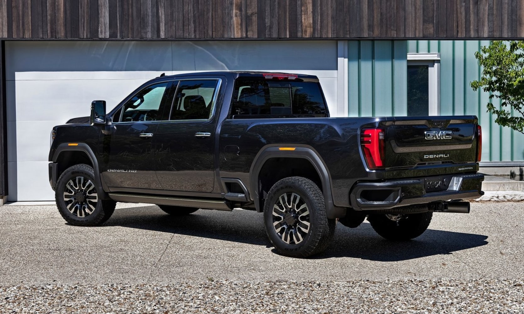 Rear driver side view of the first ever 2024 GMC Sierra 2500 HD Denali Ultimate truck