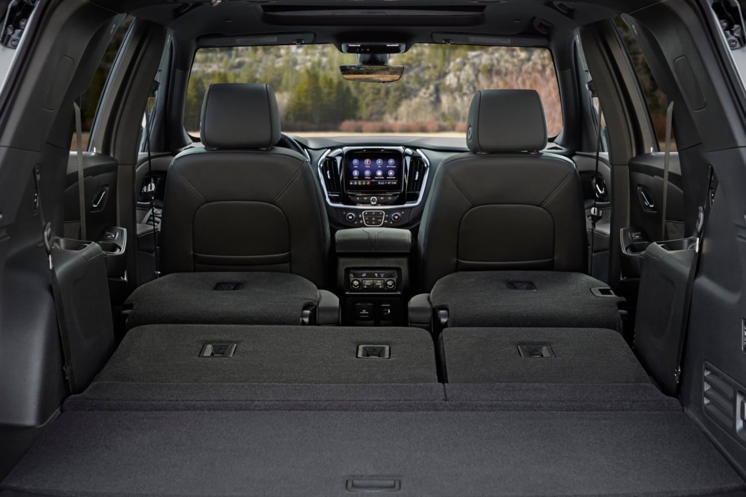 Rear exterior cargo area comparison inside the 2023 Chevy Traverse midsize SUV