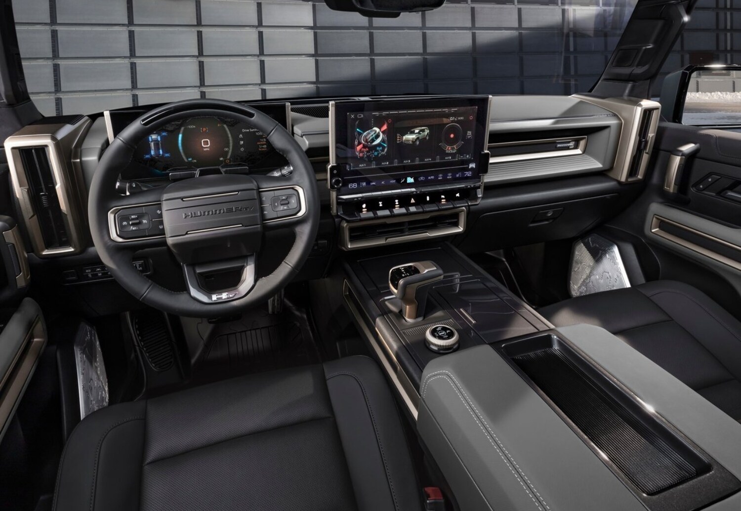 2024 GMC Hummer EV SUV Interior Comparison showing the front dashboard and front seats