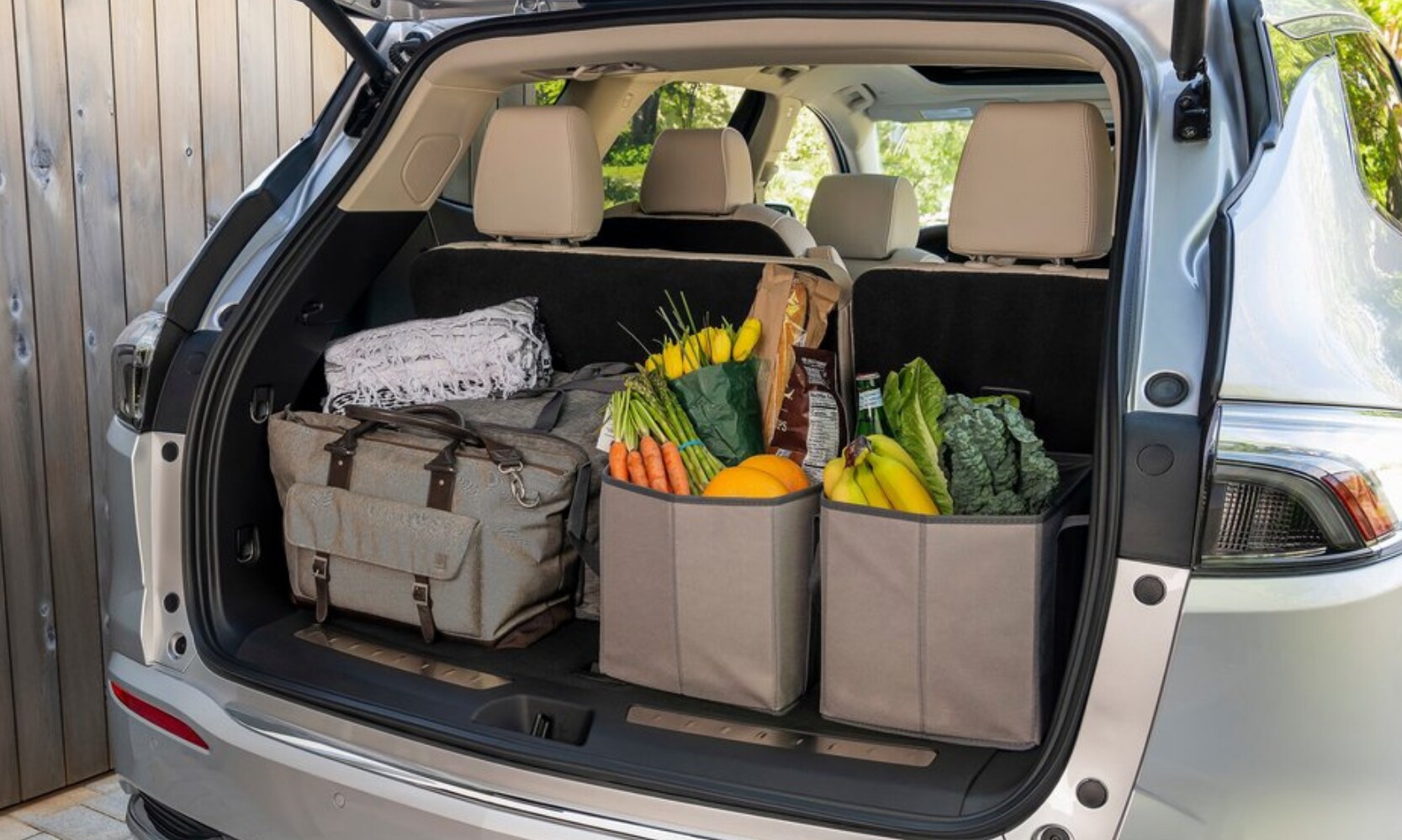 2022 Buick Enclave Cargo Space Comparison - Octane Buick GMC of Santa Fe.png Rear cargo space area inside the 2022 Buick Enclave SUV