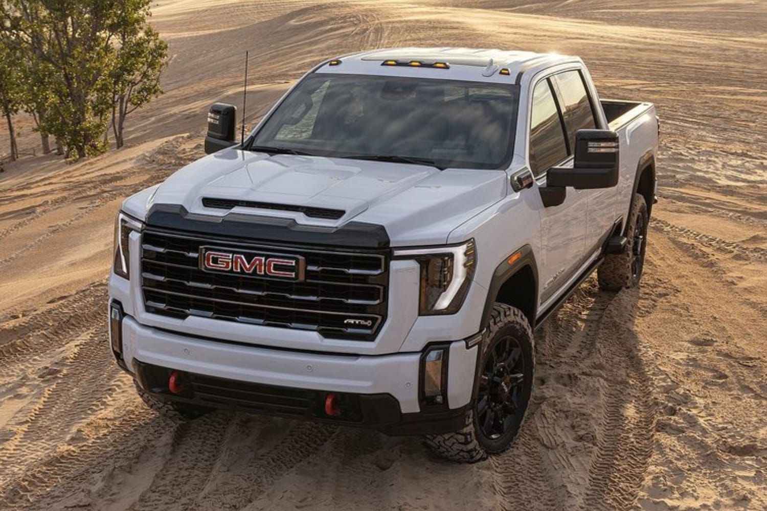 New 2024 GMC Sierra 2500 HD AT4 Truck Comparison - Octane GMC of Santa Fe.jpg 2024 GMC Sierra 2500 HD AT4 in white exterior color