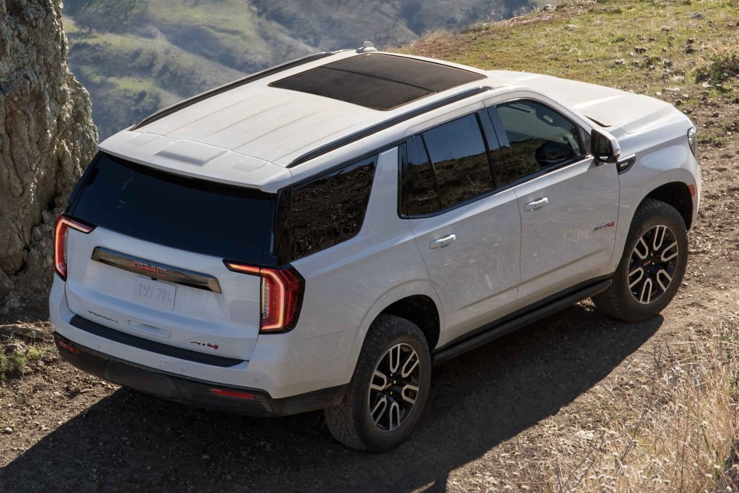 2023 GMC Yukon SUV Comparison - Octane GMC of Santa Fe.jpg Rear Exterior 2023 GMC Yukon SUV Comparison